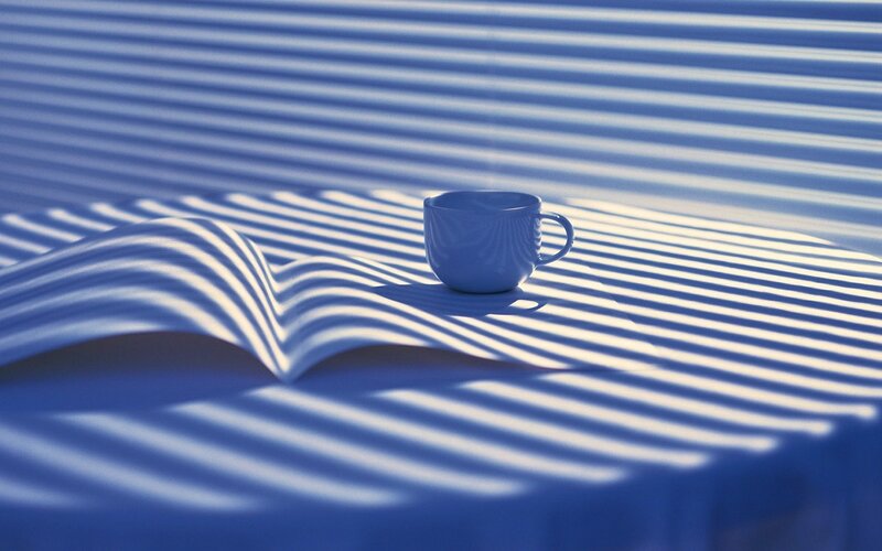 Blue Cup on Book