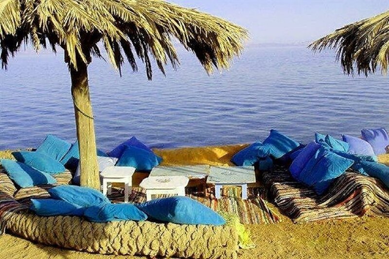 Blue Cushions on Beach