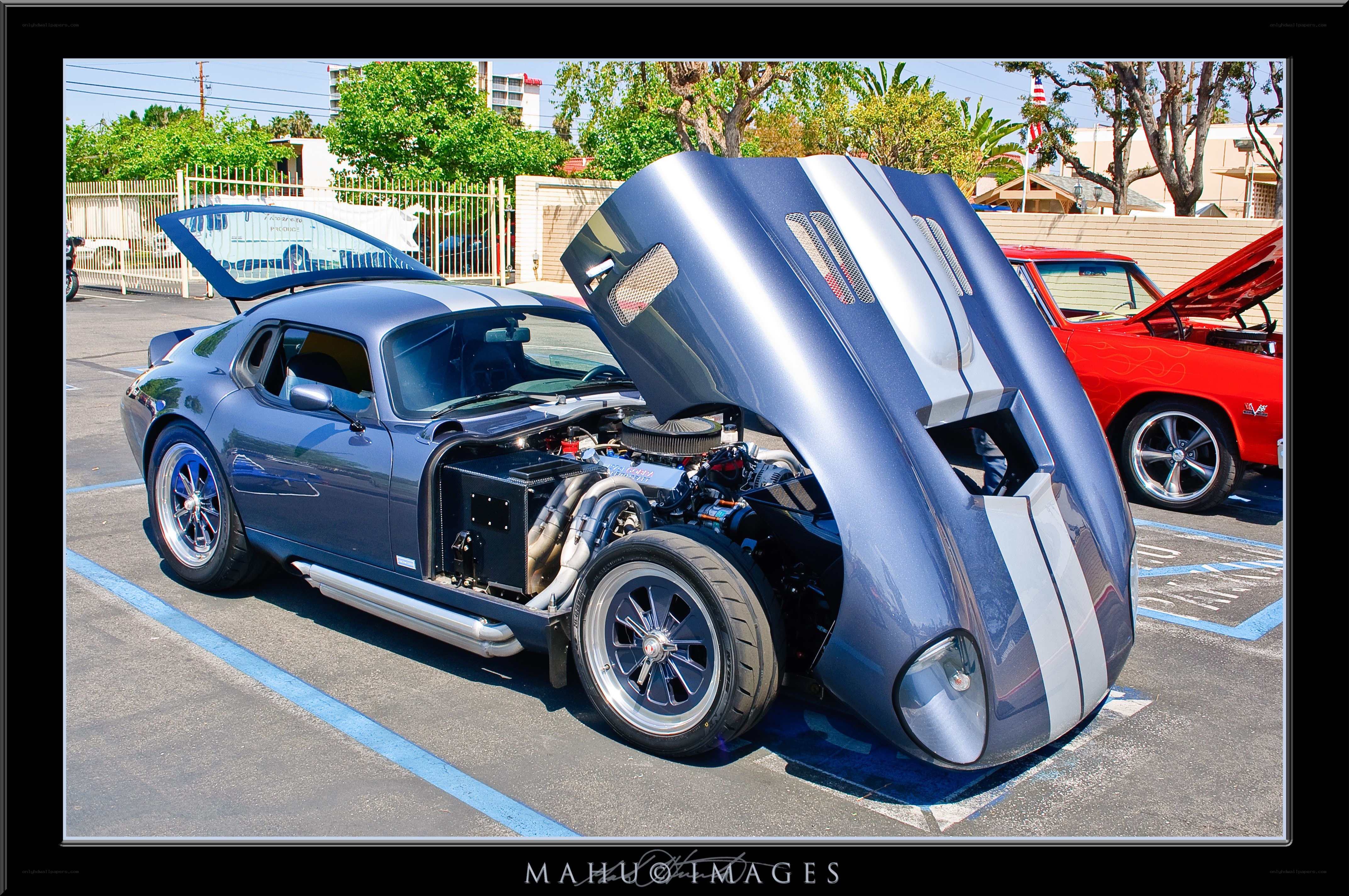Blue custom car with open hood