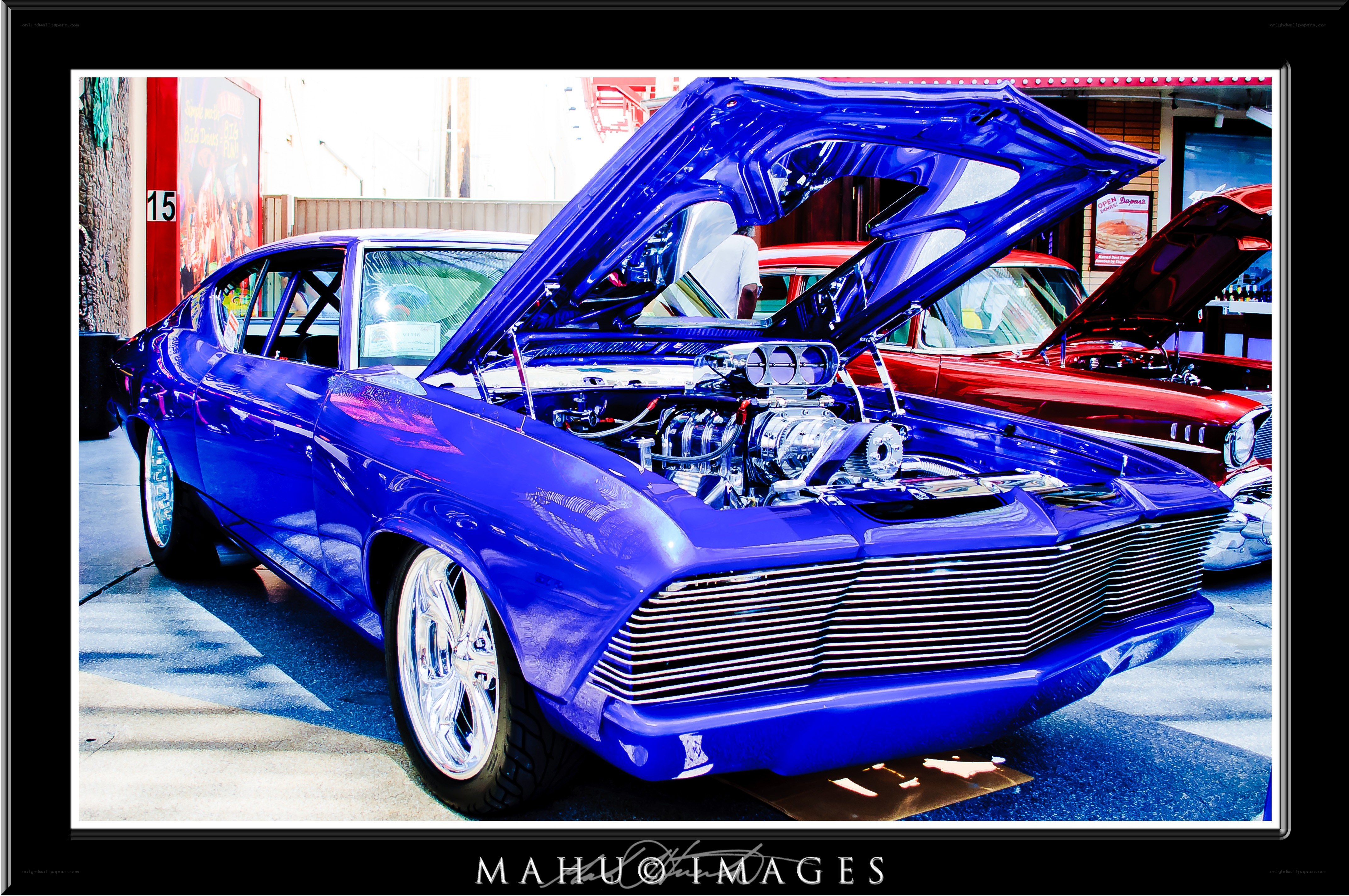 Blue custom car with open hood