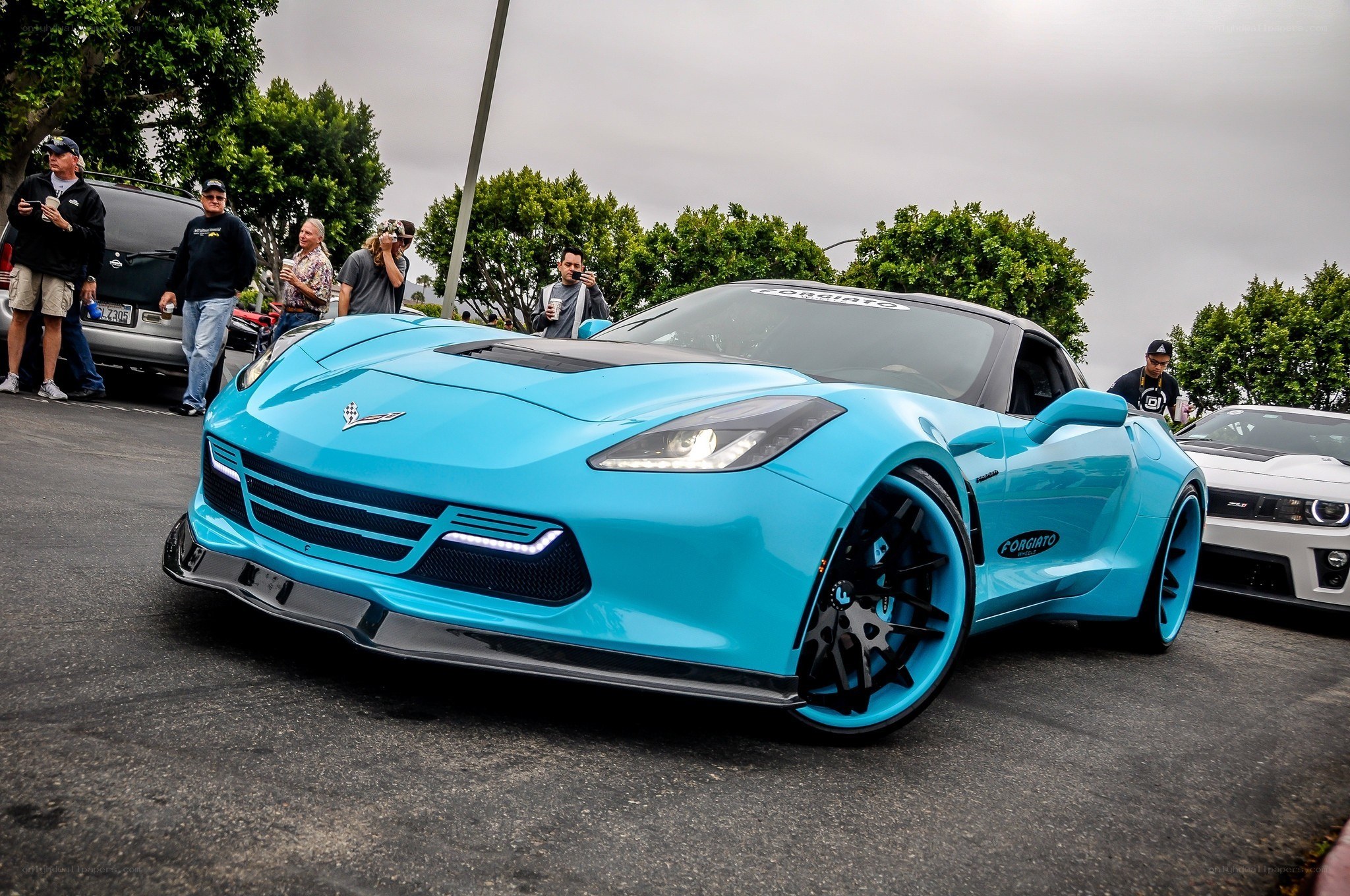 Blue custom Corvette at car show
