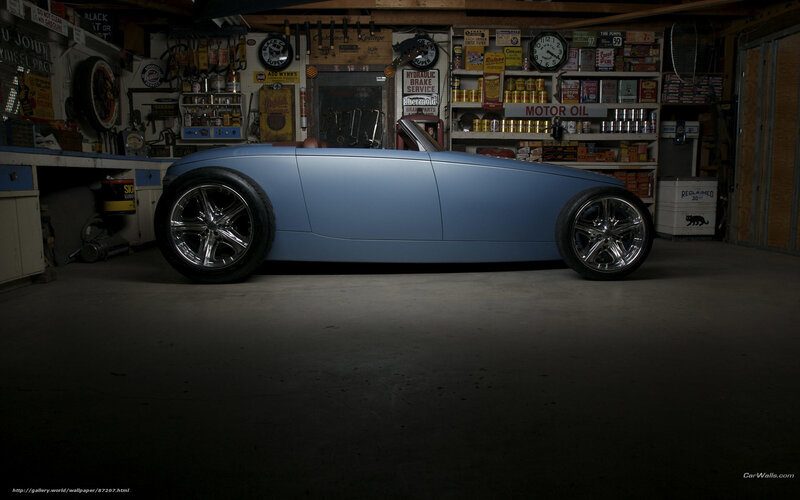 Blue custom hot rod in garage