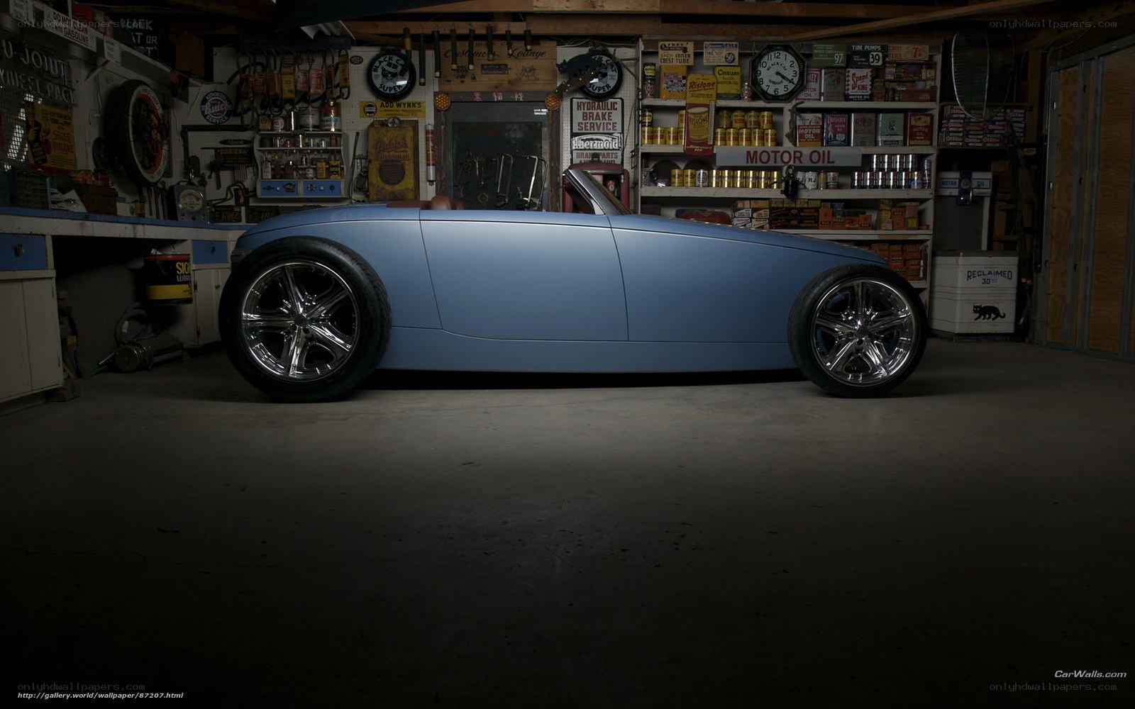 Blue custom hot rod in garage