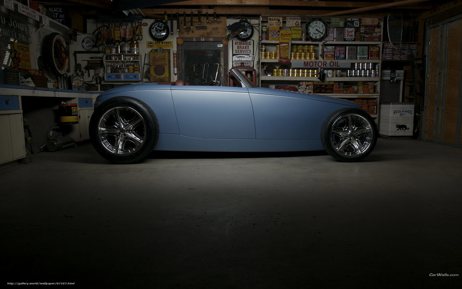 Blue custom hot rod in garage