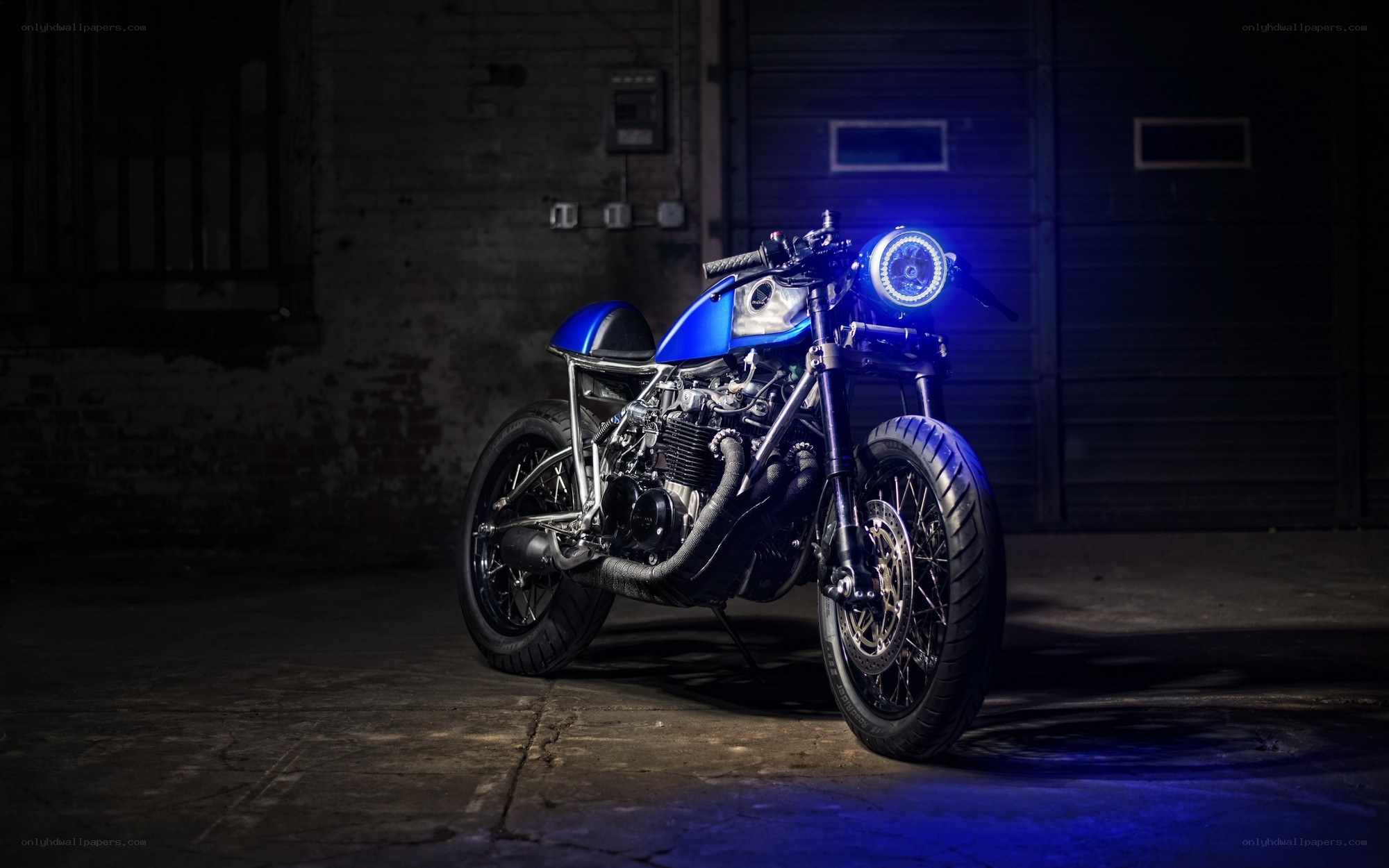 Blue custom motorcycle in garage