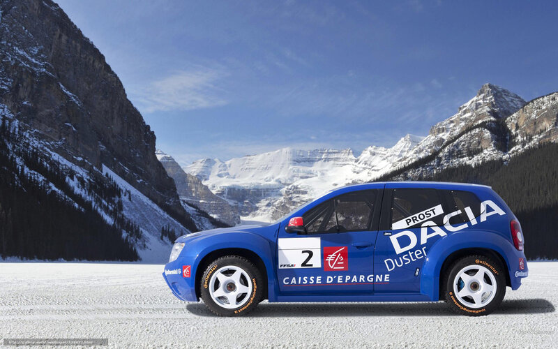 Blue Dacia rally car in mountains