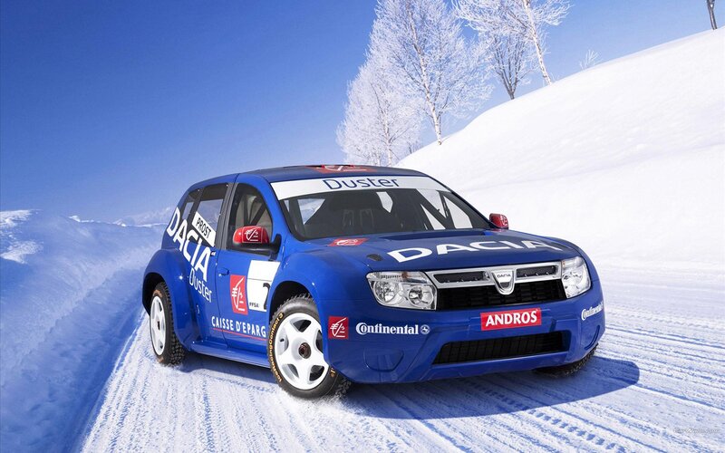Blue Dacia rally car on snow