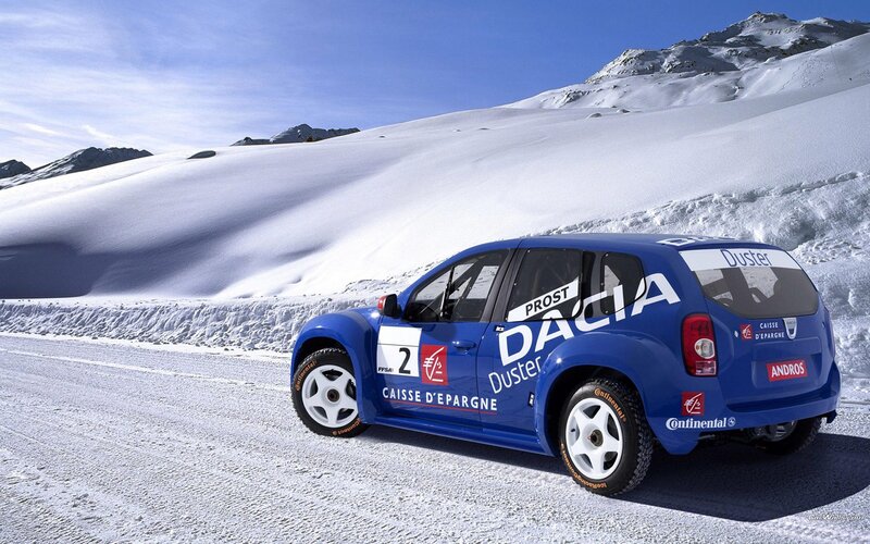 Blue Dacia rally car on snow