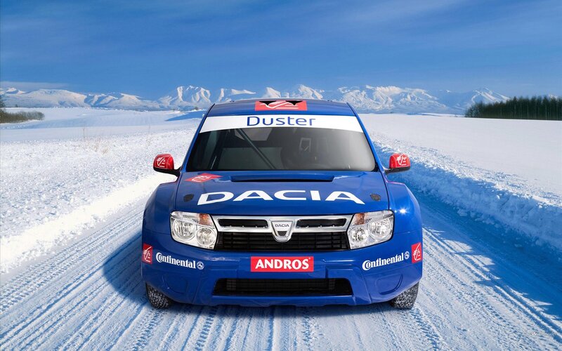 Blue Dacia rally car on snow