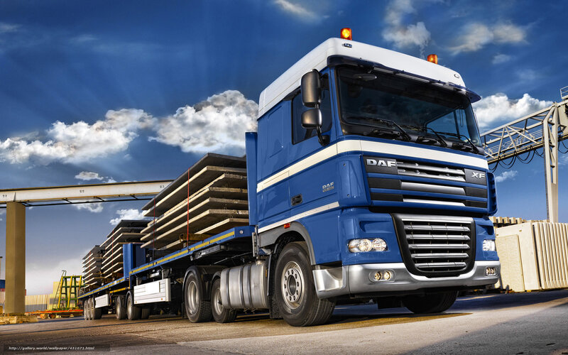 Blue DAF XF truck carrying cargo