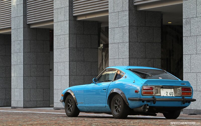 Blue Datsun 240Z in urban setting