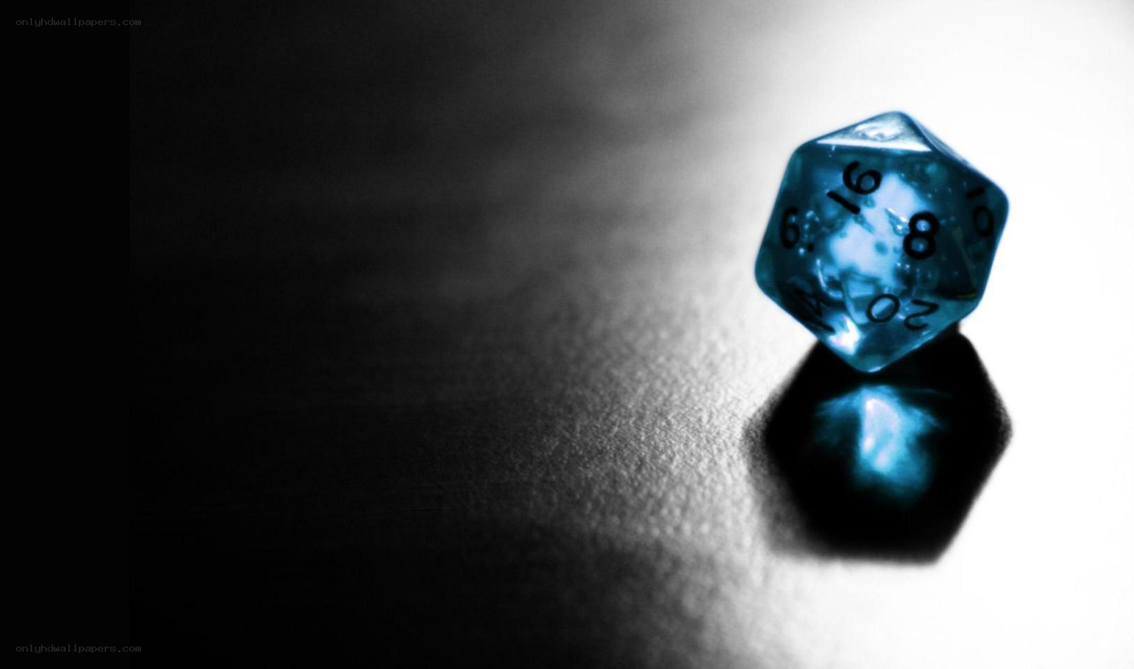 Blue dice on dark surface