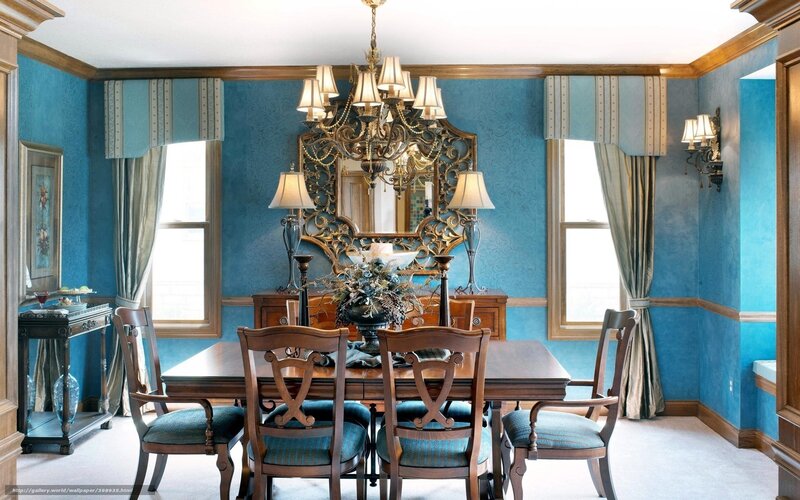 blue dining room with chandelier