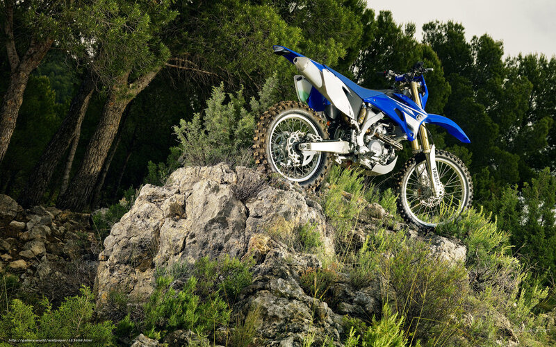 Blue Dirt Bike on Rocks