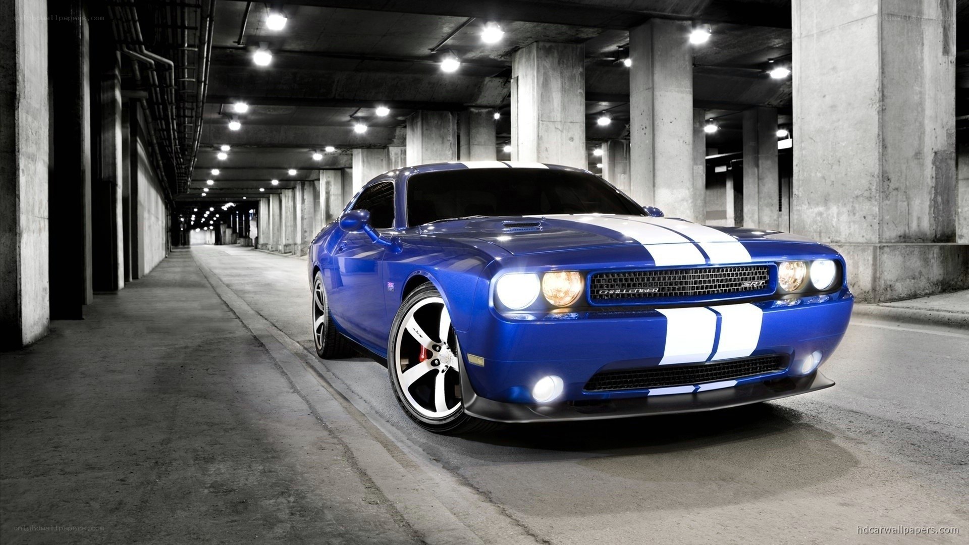 blue dodge challenger in garage