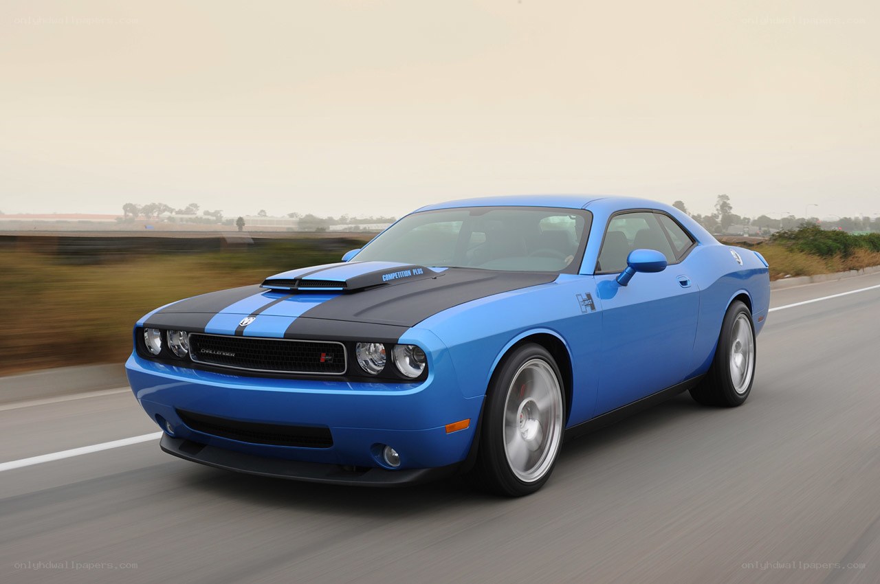 blue dodge challenger in motion