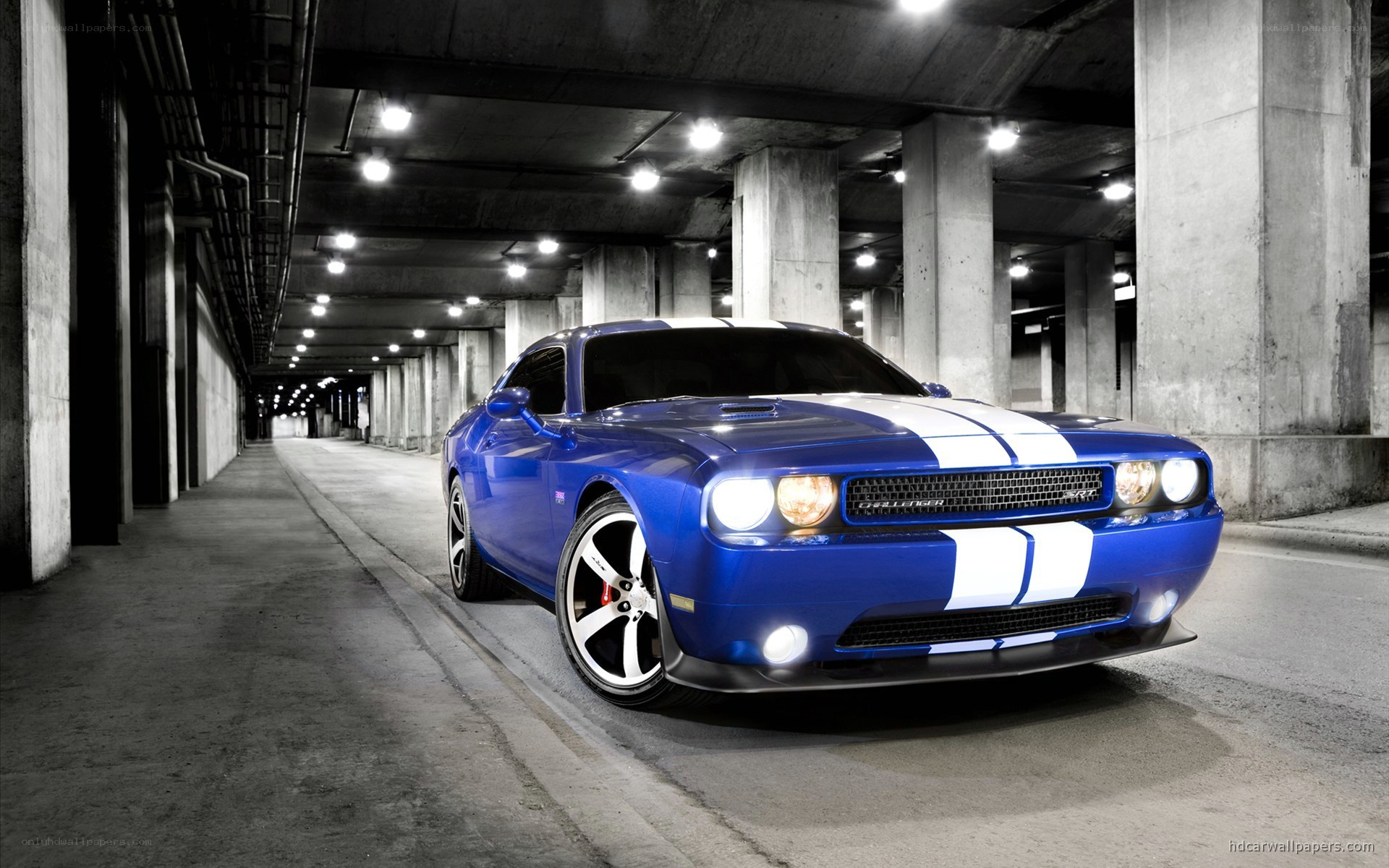 blue dodge challenger in tunnel