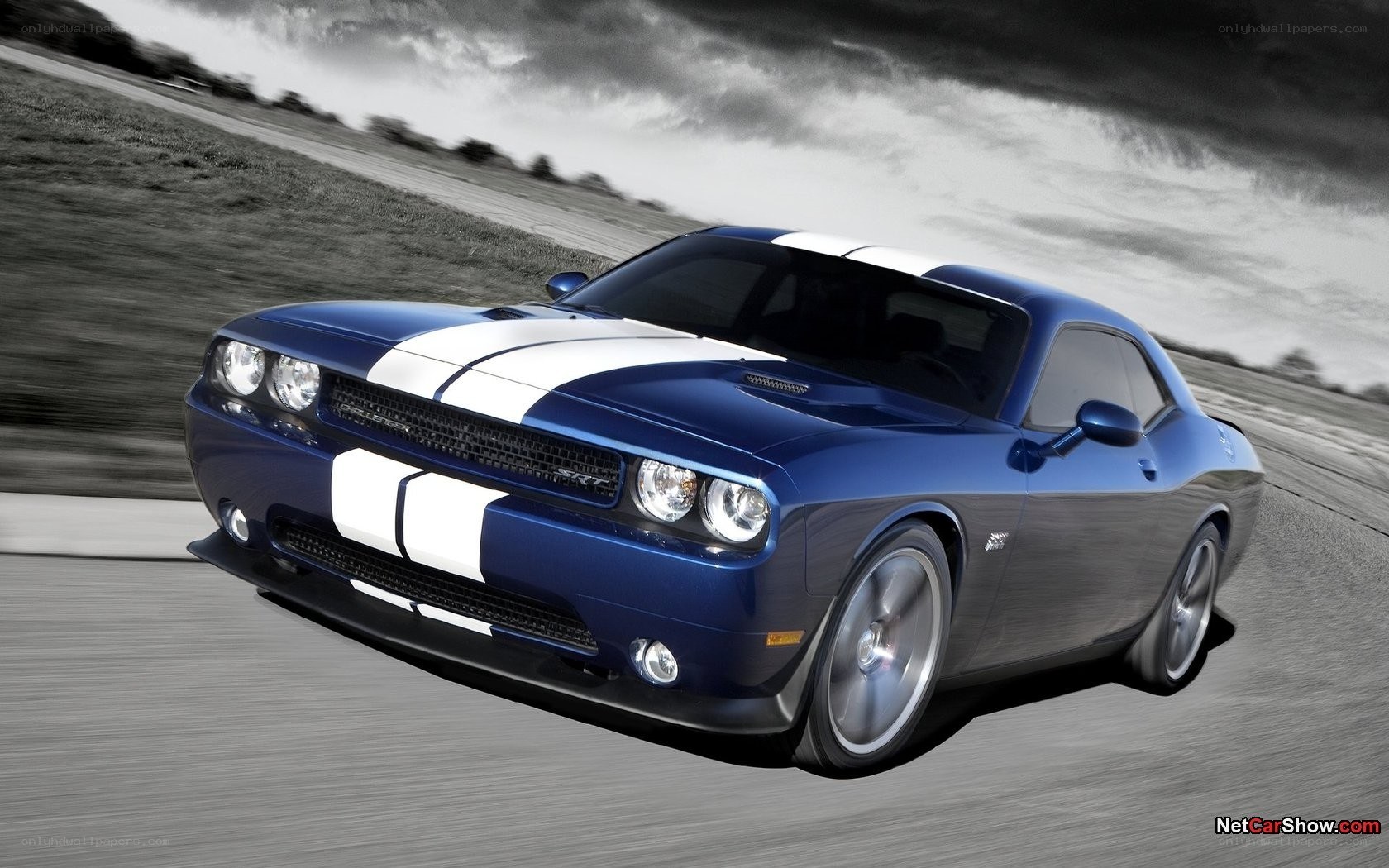 Blue Dodge Challenger on track