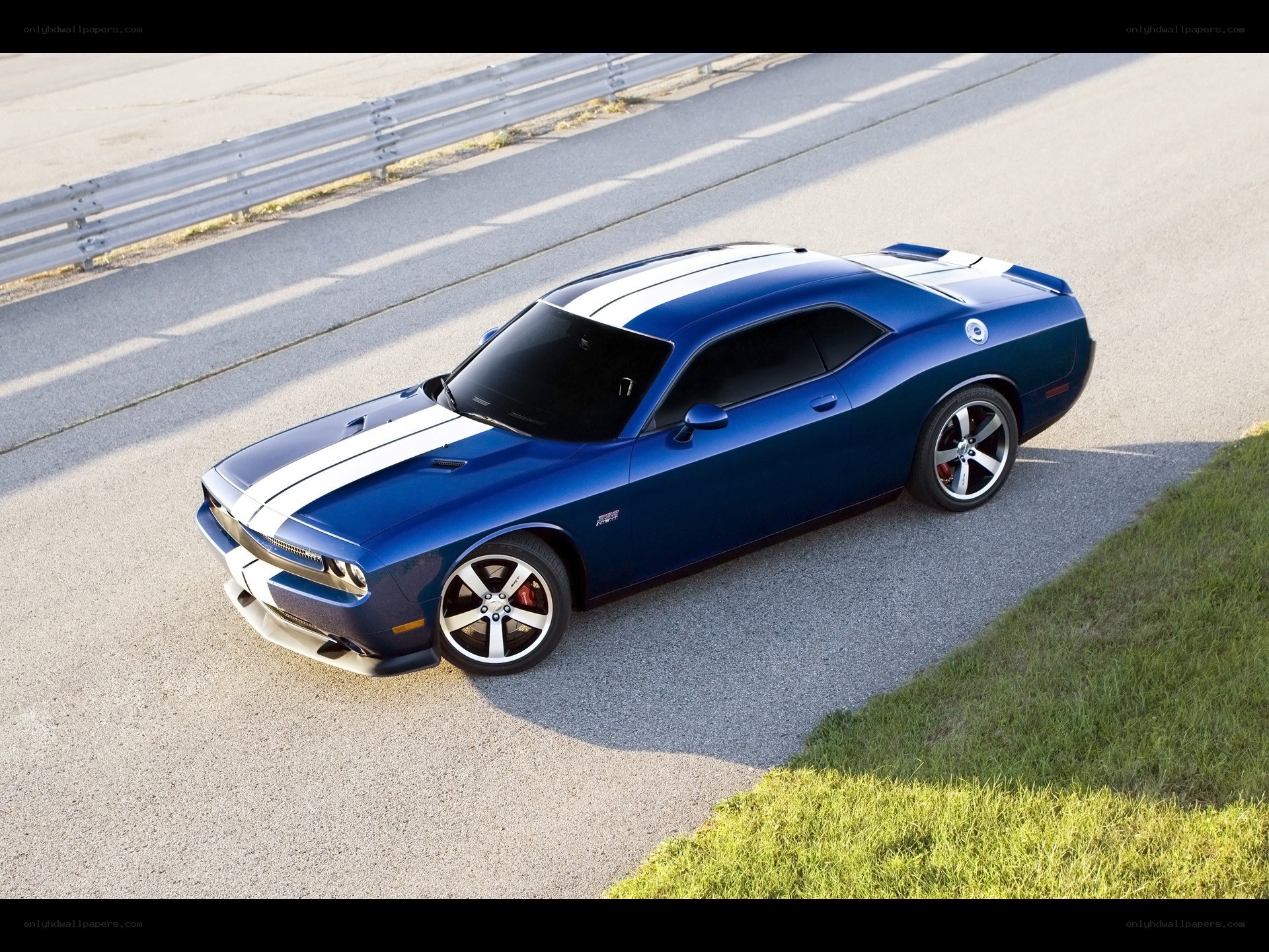 Blue Dodge Challenger on track