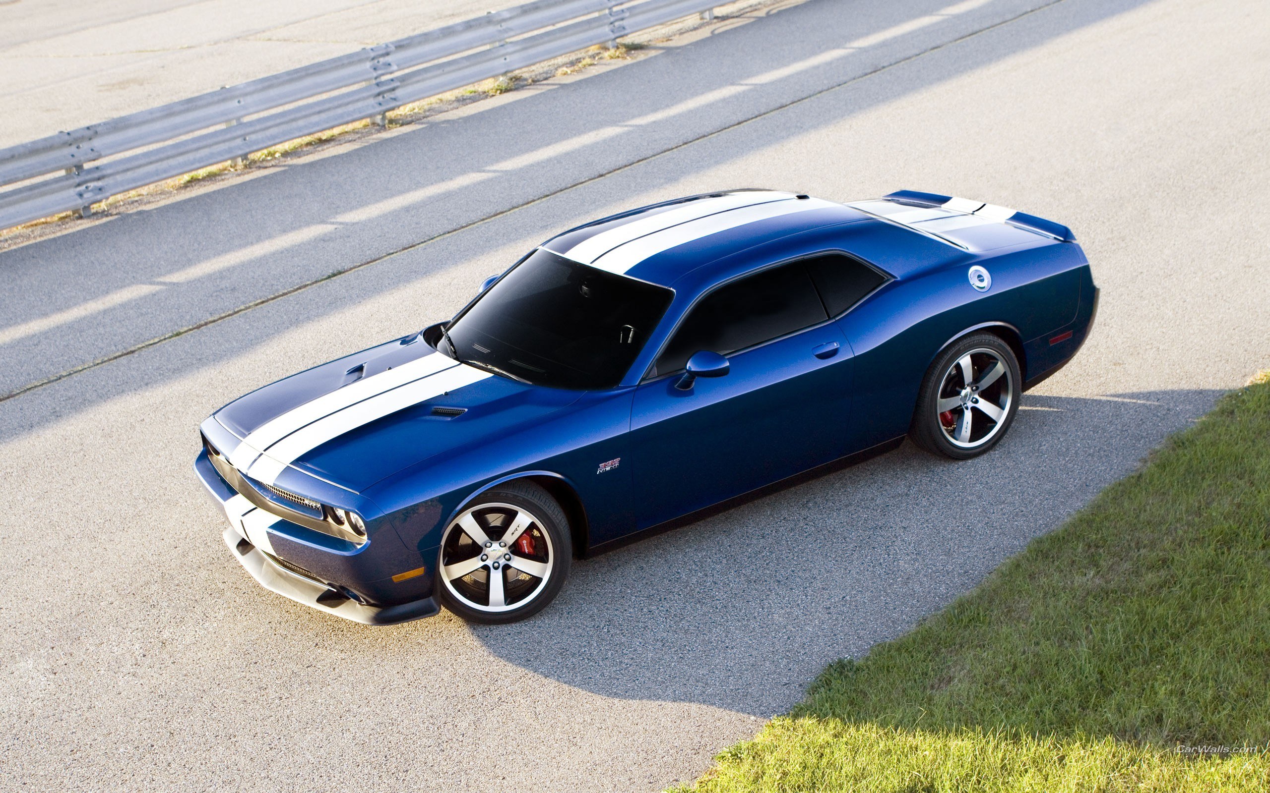 Blue Dodge Challenger on track