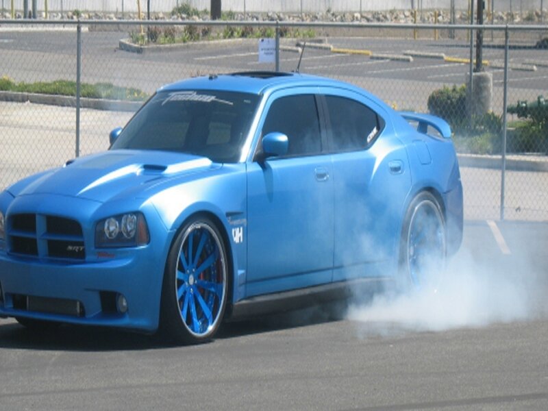 blue dodge charger drifting