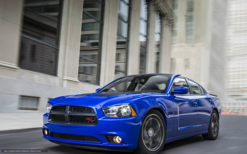 blue dodge charger in motion