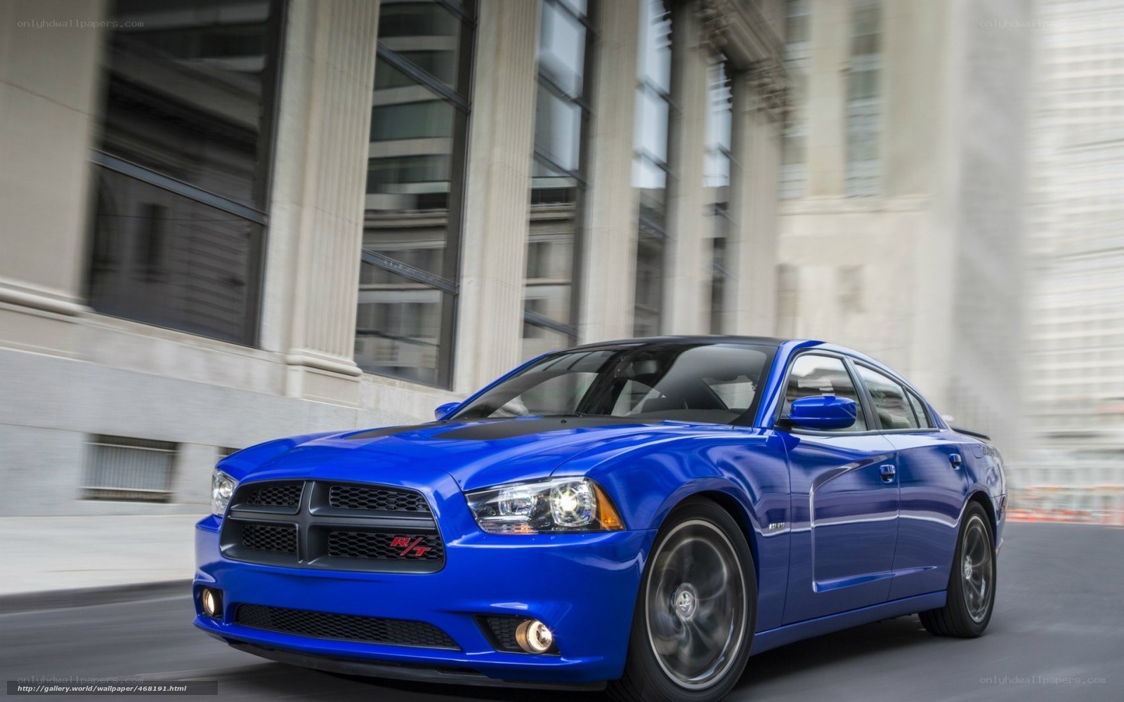blue dodge charger in motion