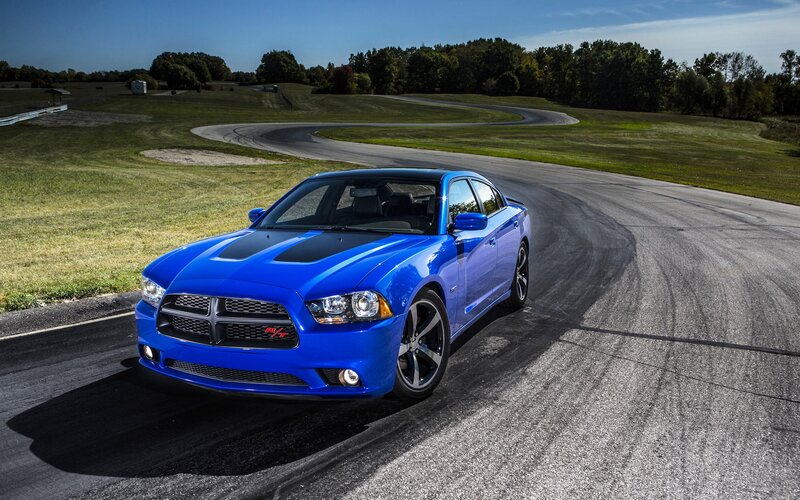 Blue Dodge Charger on a racetrack