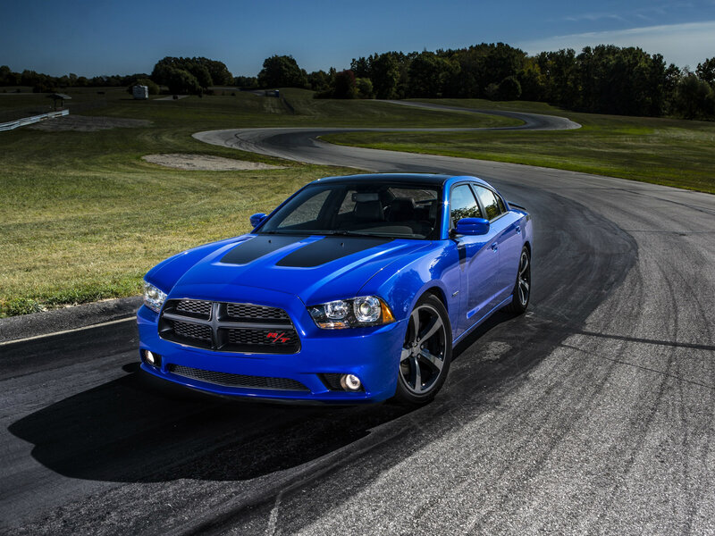 Blue Dodge Charger on a racetrack