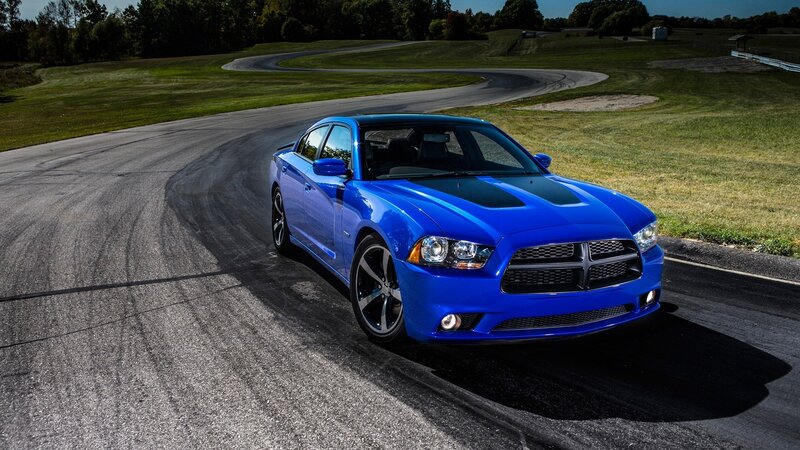 blue dodge charger on racetrack