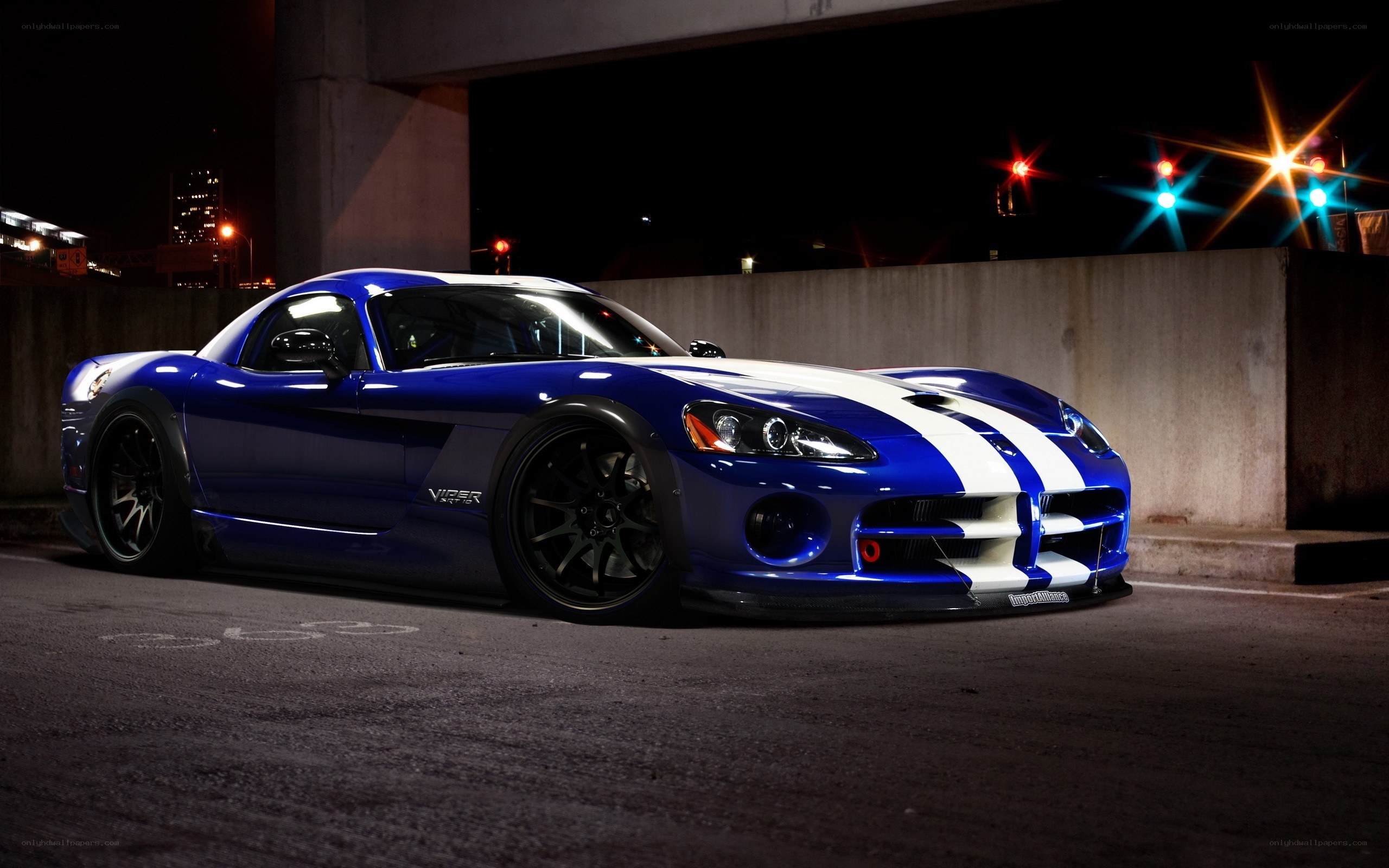 blue dodge viper at night