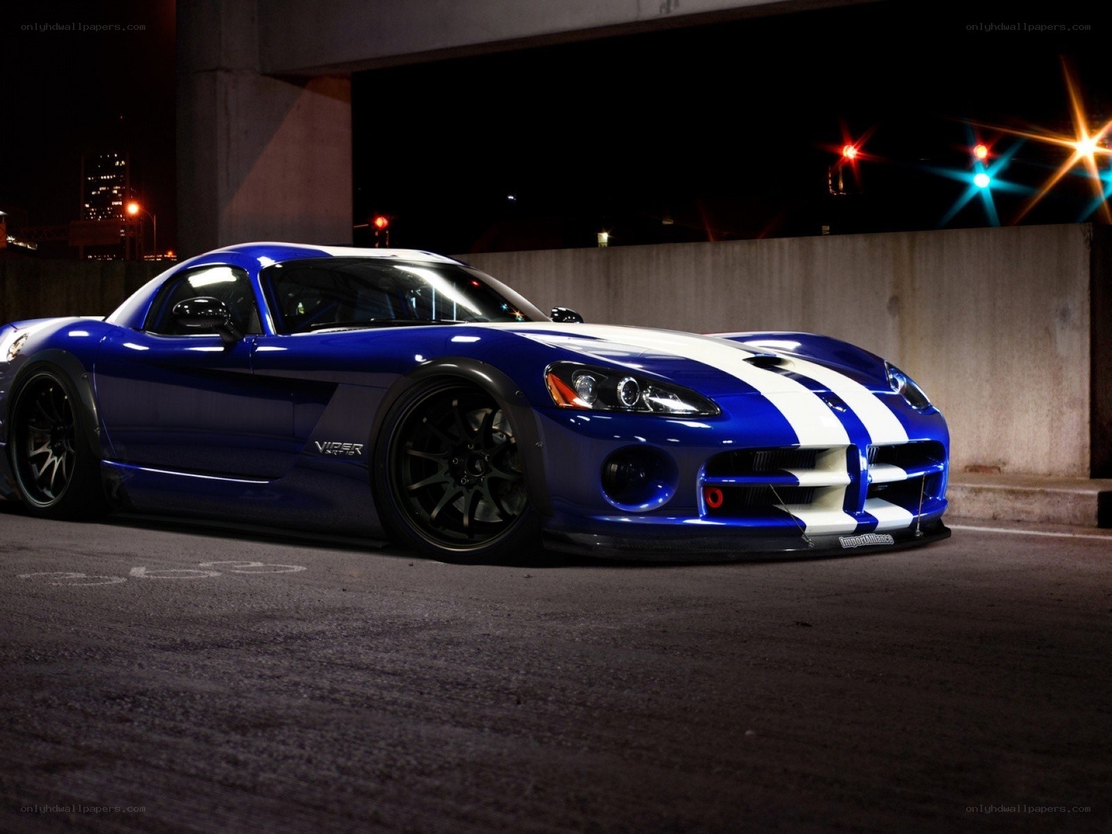 Blue Dodge Viper at night