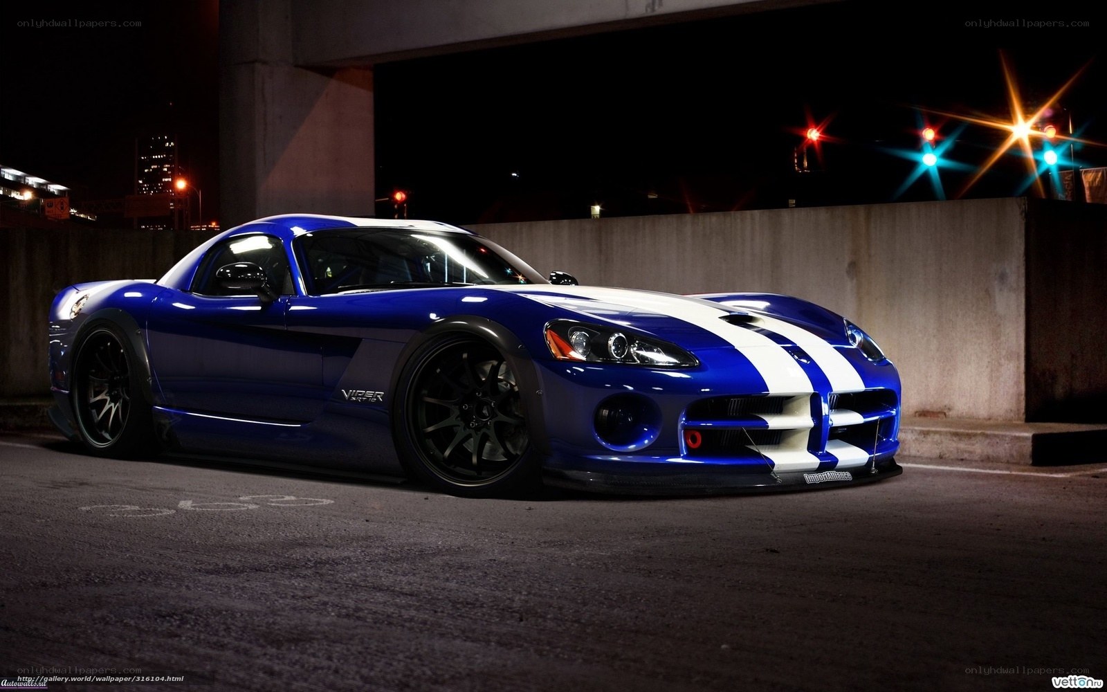 Blue Dodge Viper at night