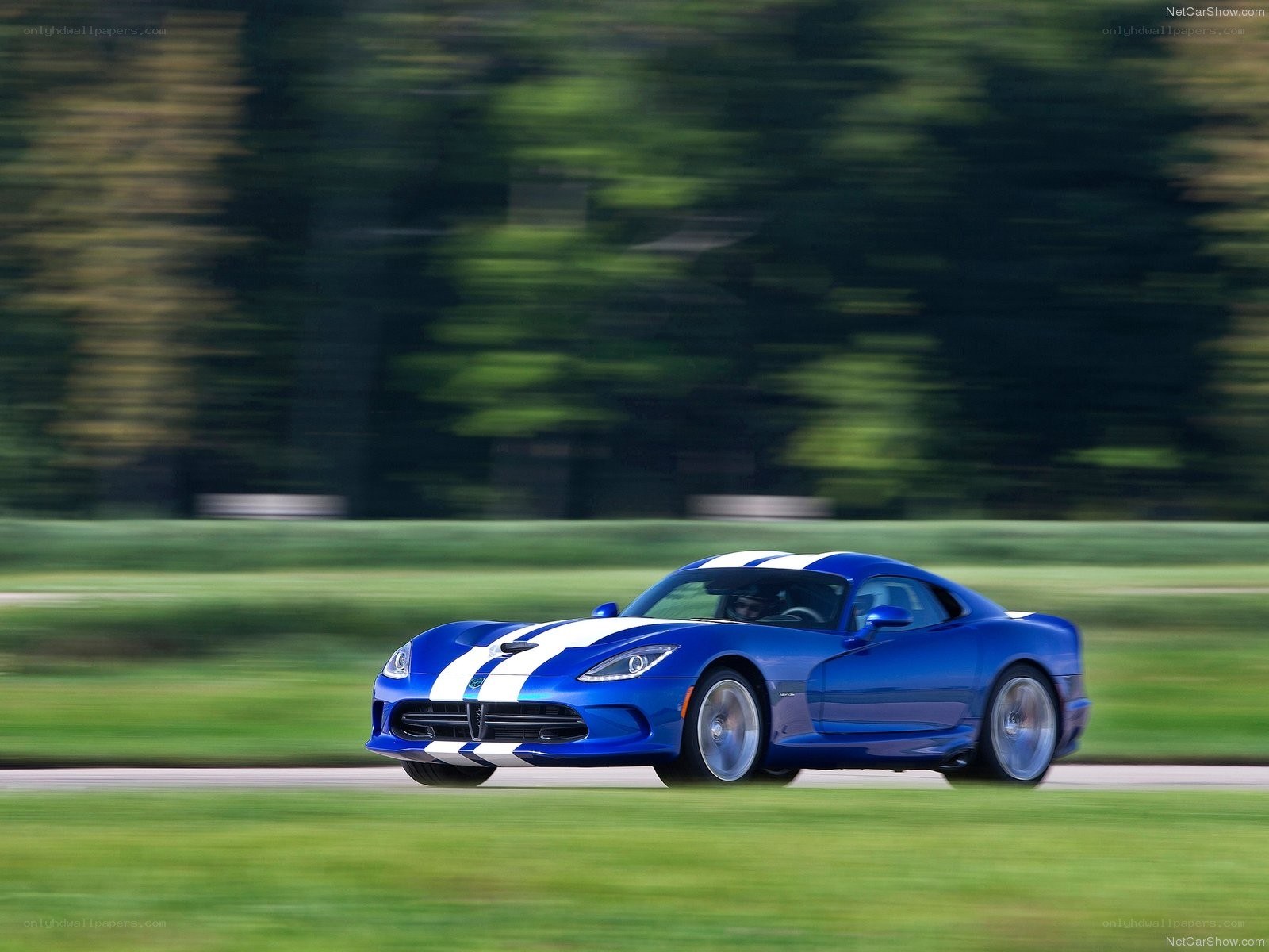 Blue Dodge Viper in motion