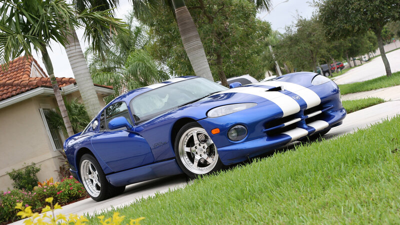 Blue Dodge Viper on a suburban street