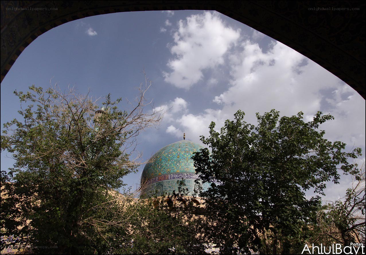 Blue dome mosque through arch