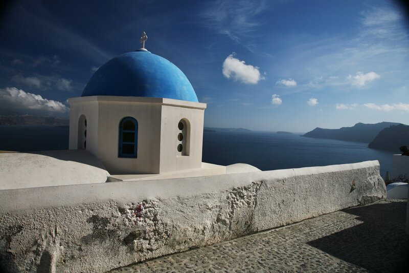 Blue-domed chapel overlooking the sea