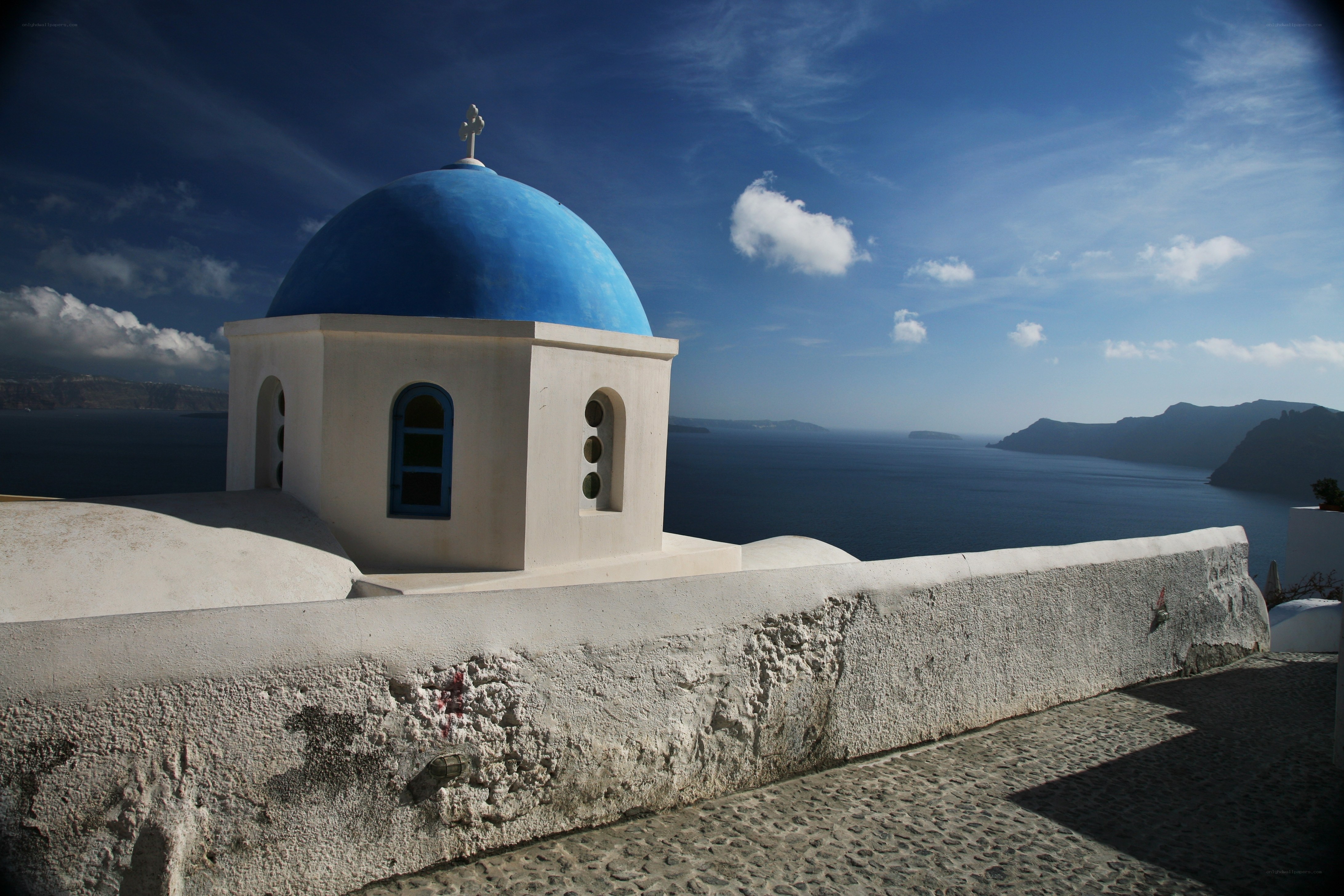 Blue-domed chapel overlooking the sea