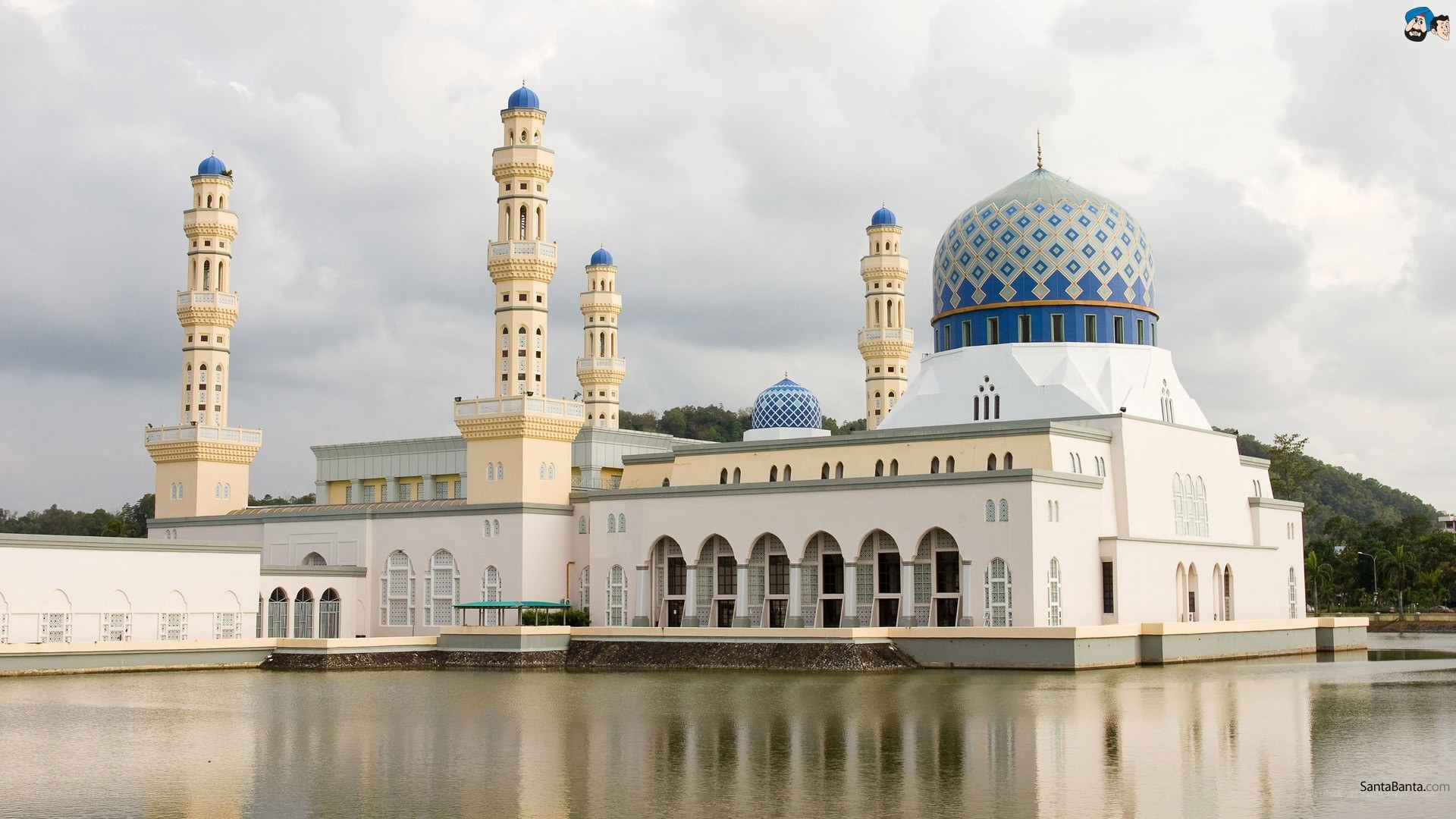 Blue-domed mosque by water