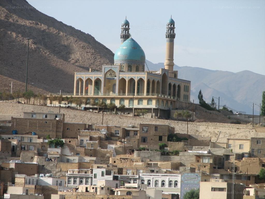 Blue-domed mosque on hillside