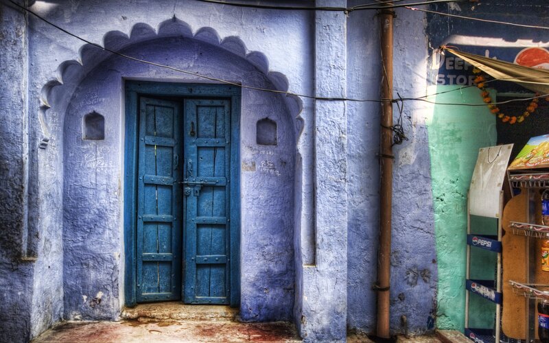 blue door in old alley