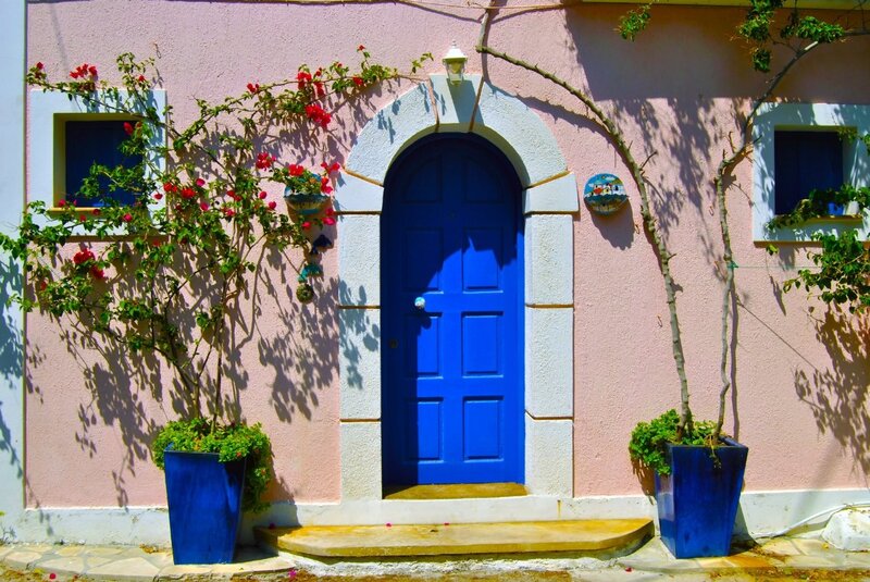 Blue door on pink house