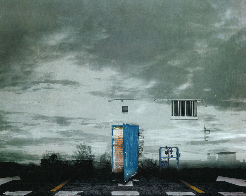 Blue door under stormy sky
