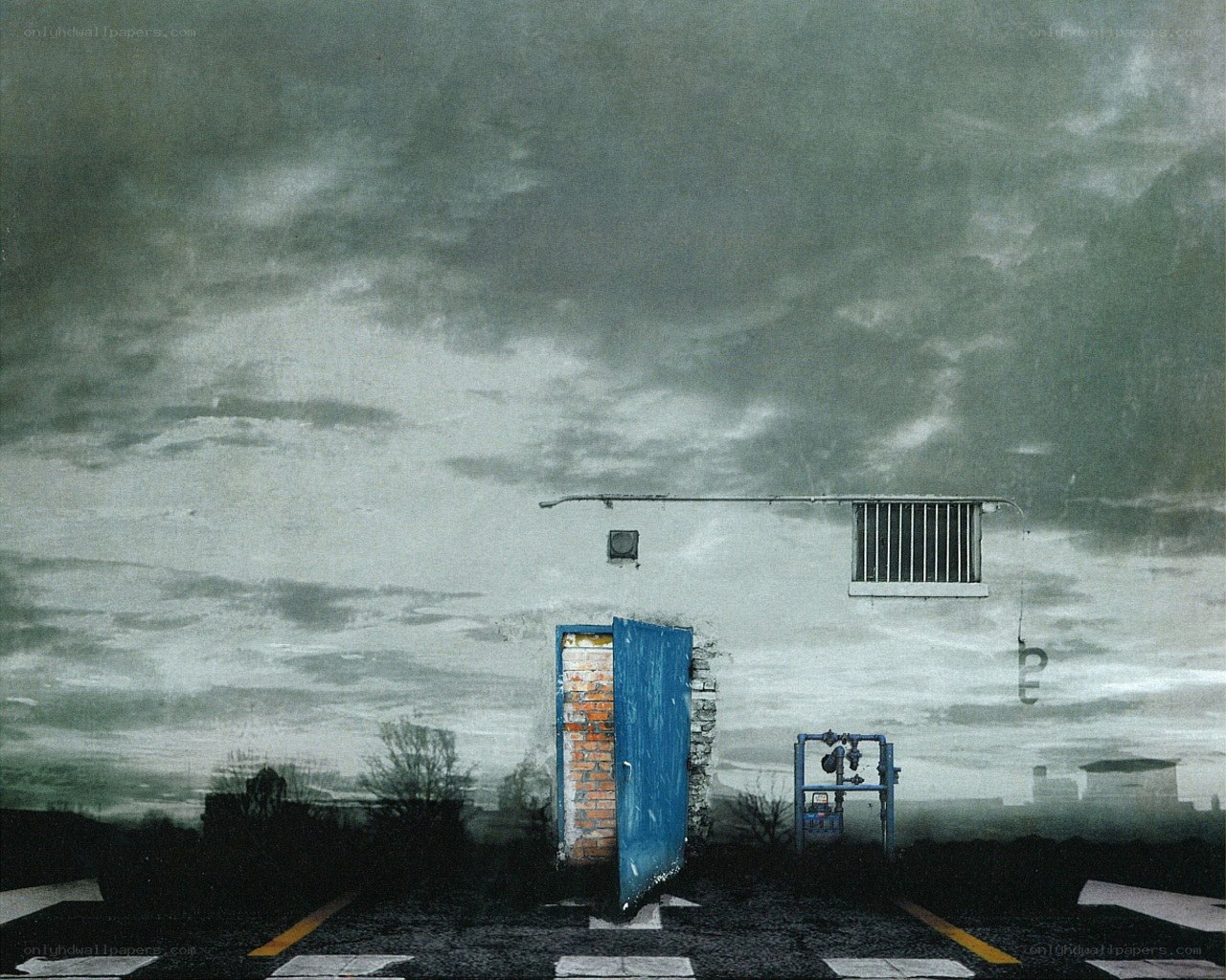 Blue door under stormy sky