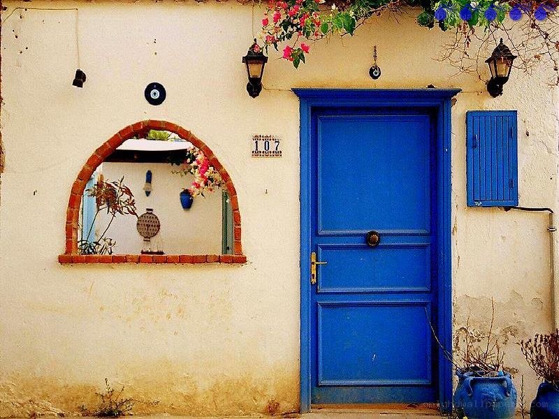 Blue door with arched window