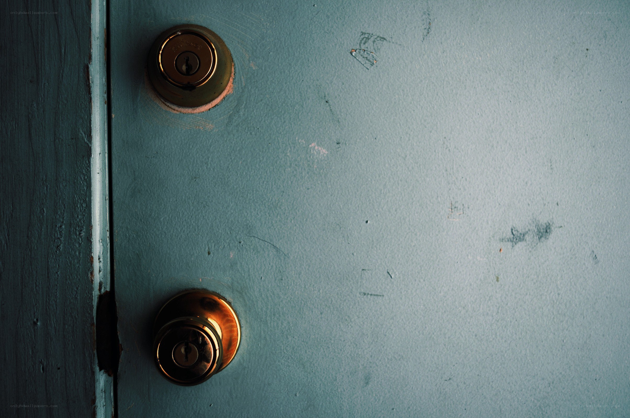 blue door with brass hardware
