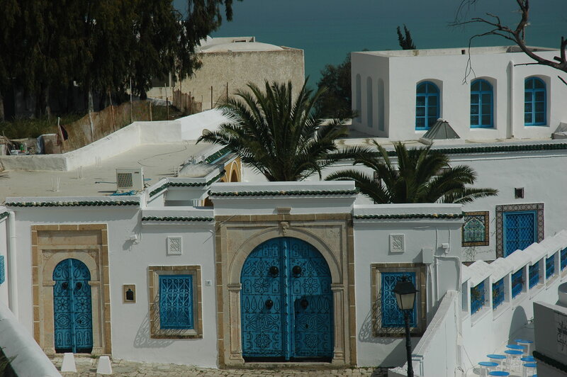 Blue doors in a white village