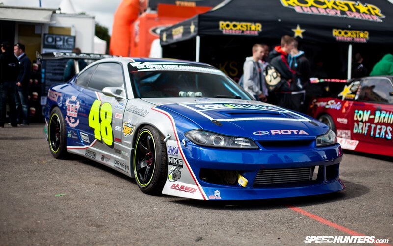 Blue drift car at a motorsport event