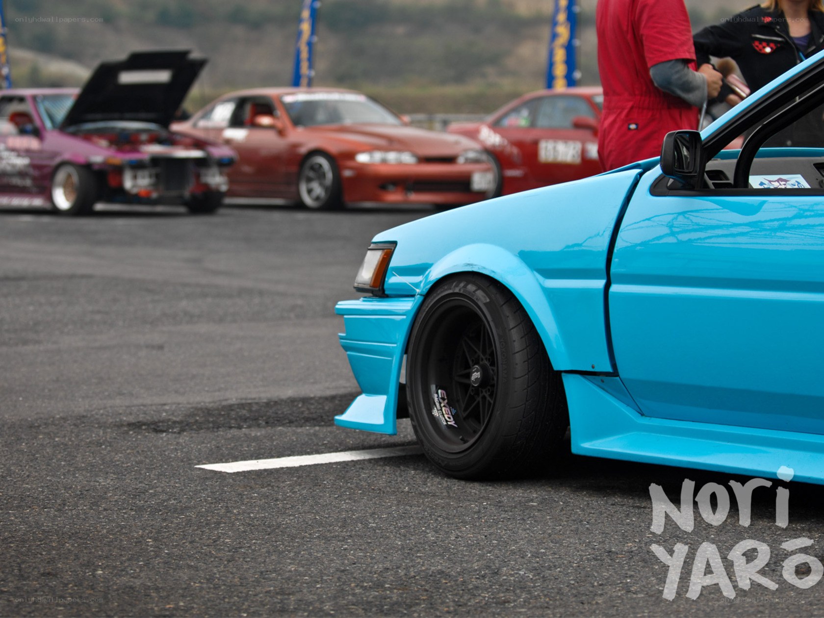 Blue drift car at a race