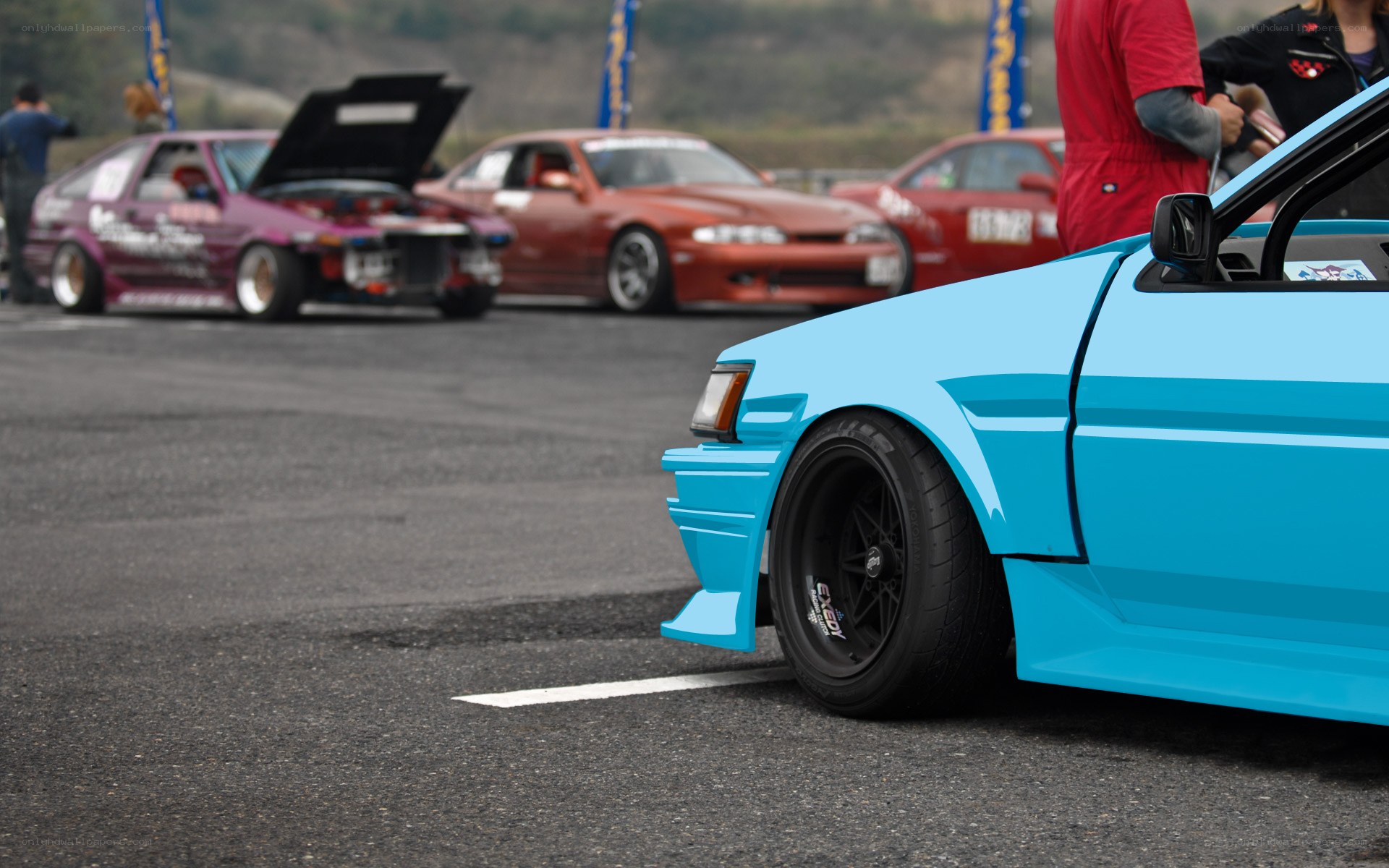 blue drift car at racetrack